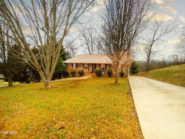 5659 Browning Way, Russellville, TN 37860 - view of front of home featuring covered porch, driveway, and a front yard