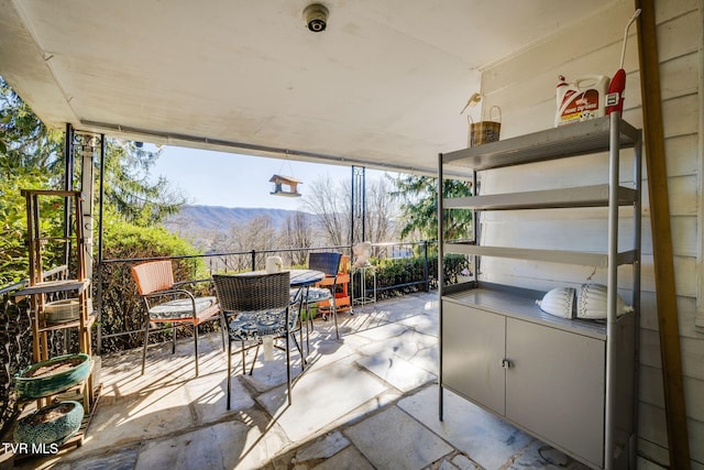 view of patio featuring a mountain view