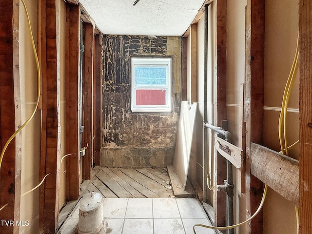 bathroom with a textured ceiling