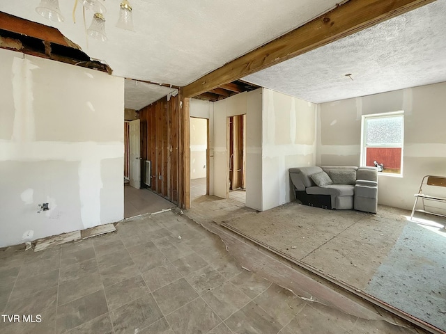 interior space with a textured ceiling