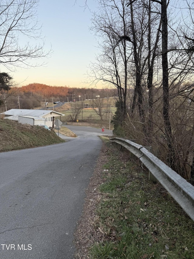 view of road featuring traffic signs