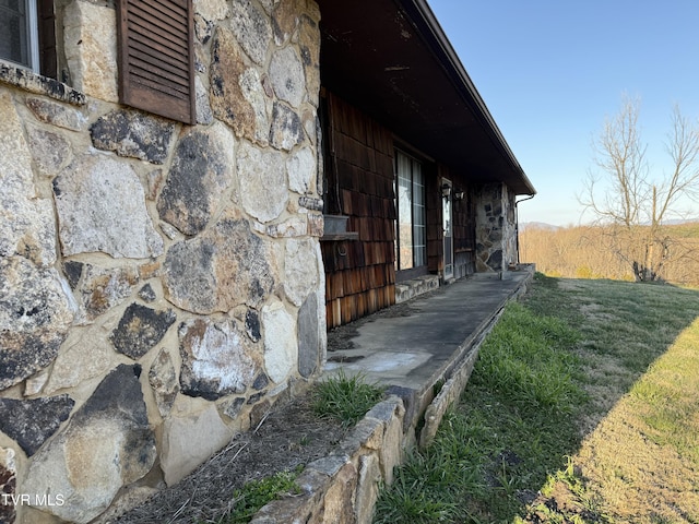 view of home's exterior featuring stone siding