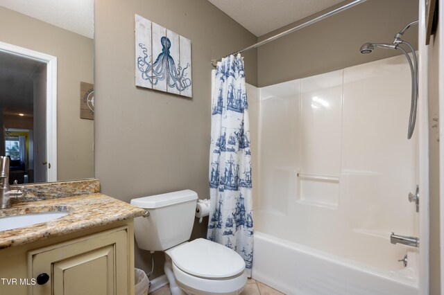 bathroom featuring shower / tub combo, toilet, a textured ceiling, and vanity