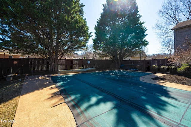 view of pool featuring a fenced backyard