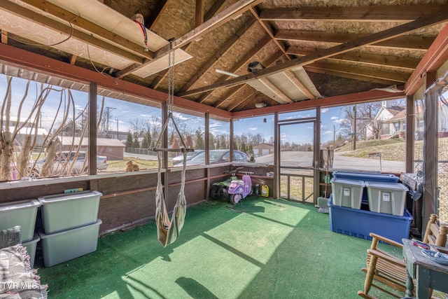 sunroom with vaulted ceiling