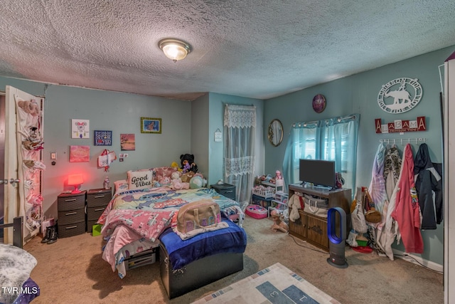 carpeted bedroom with a textured ceiling