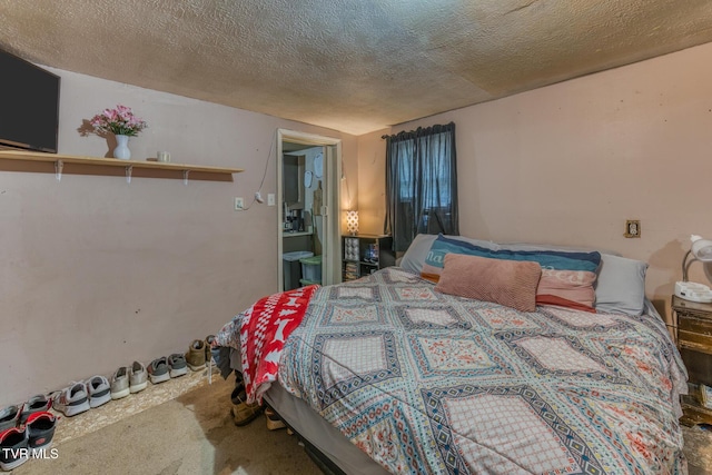 carpeted bedroom with a textured ceiling