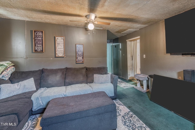 carpeted living area featuring ceiling fan and a textured ceiling