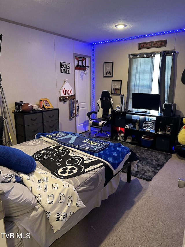 bedroom featuring carpet