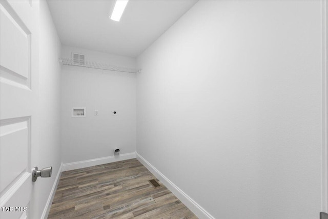 washroom with laundry area, washer hookup, wood finished floors, visible vents, and electric dryer hookup