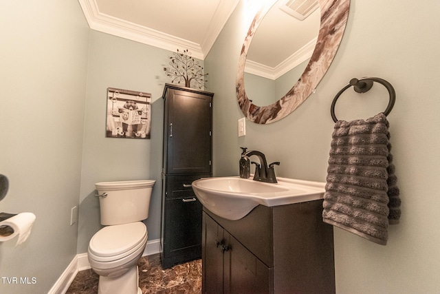 bathroom with visible vents, baseboards, toilet, crown molding, and vanity