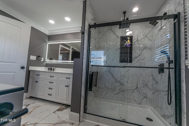 bathroom featuring a marble finish shower, ornamental molding, and vanity