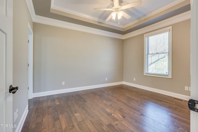 unfurnished room featuring a ceiling fan, dark wood-style flooring, visible vents, and baseboards