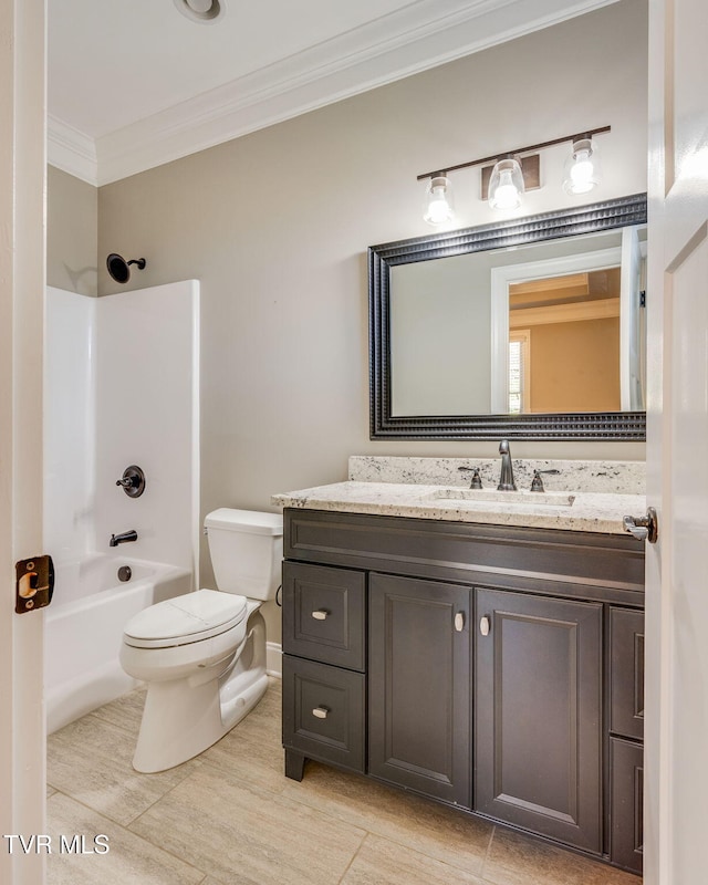 bathroom with shower / washtub combination, vanity, toilet, and crown molding