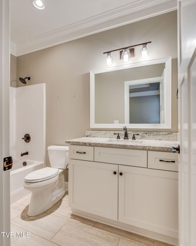 bathroom with ornamental molding, shower / washtub combination, vanity, and toilet