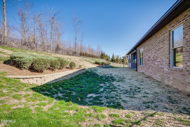 view of yard with fence