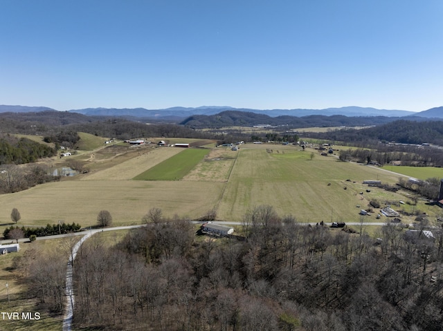 drone / aerial view with a rural view and a mountain view