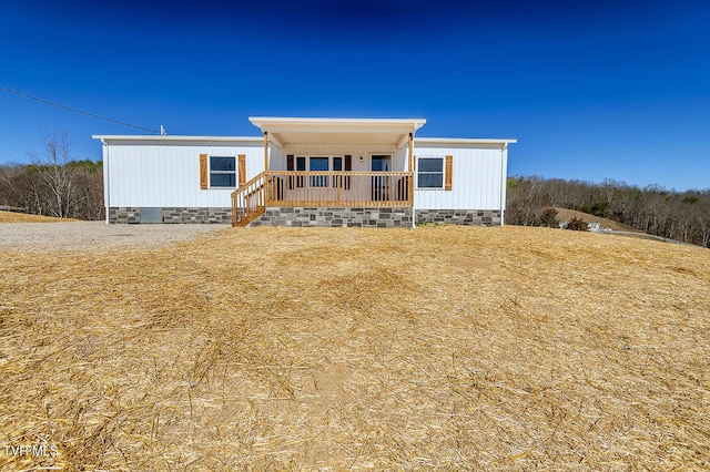 manufactured / mobile home with crawl space and a porch