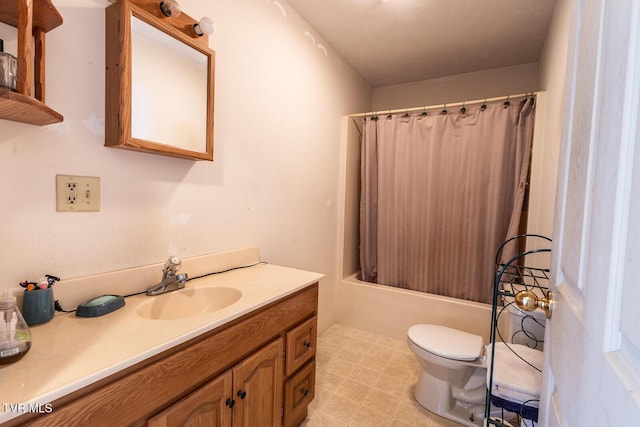 bathroom featuring shower / bath combo with shower curtain, toilet, and vanity