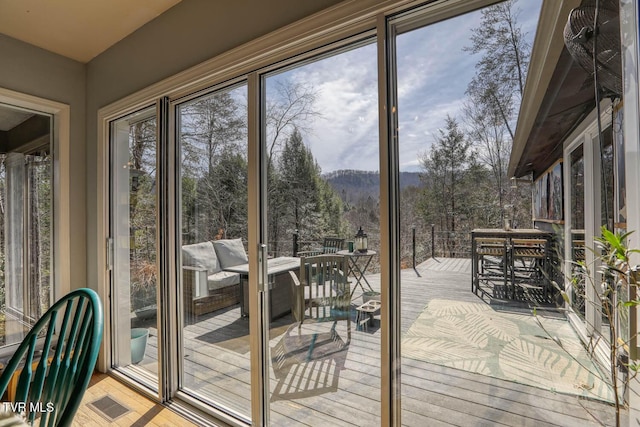 entryway featuring visible vents and a mountain view