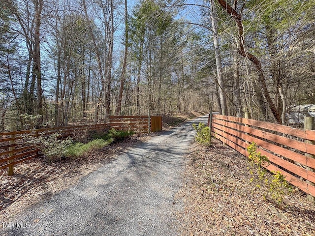 view of street with a wooded view