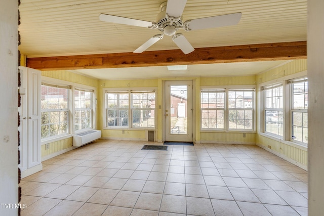 unfurnished sunroom with beam ceiling and ceiling fan