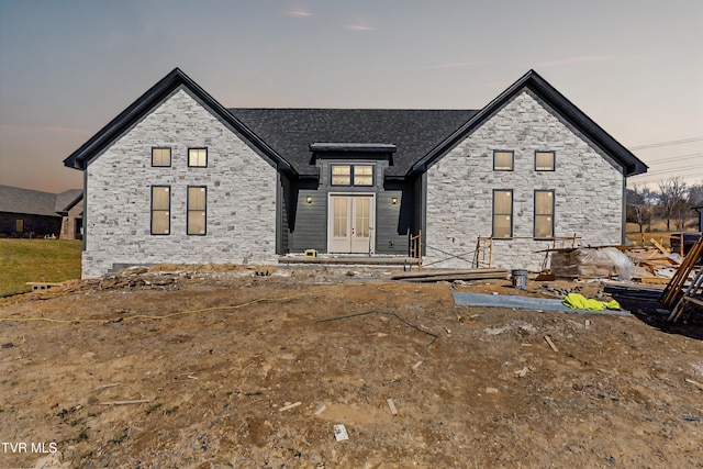 view of front of home featuring stone siding