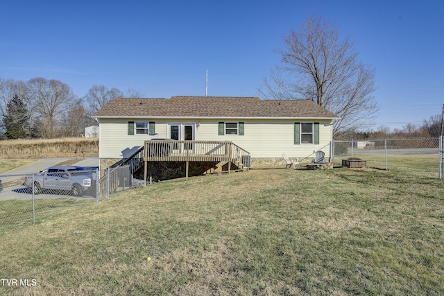 back of property featuring a lawn, a fenced backyard, stairs, a gate, and a wooden deck