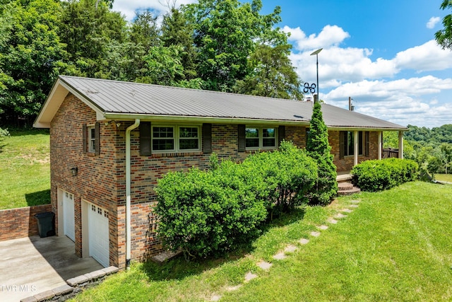 472 Harmony Rd, Jonesborough, TN 37659 - single story home with a front lawn, concrete driveway, a garage, metal roof, and brick siding