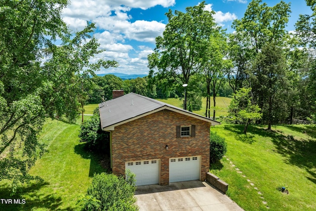 472 Harmony Rd, Jonesborough, TN 37659 - view of property exterior with concrete driveway, a yard, brick siding, and a garage