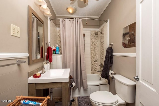 bathroom with toilet, shower / bathtub combination with curtain, ornamental molding, and vanity