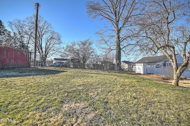 view of yard with fence