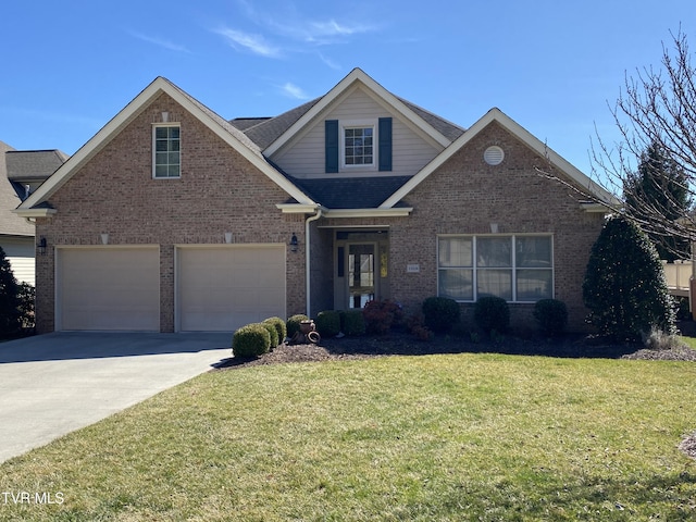 view of front of house with concrete driveway, brick siding, a front yard, and a shingled roof