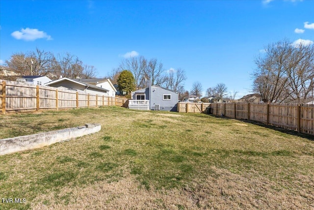 view of yard with a fenced backyard