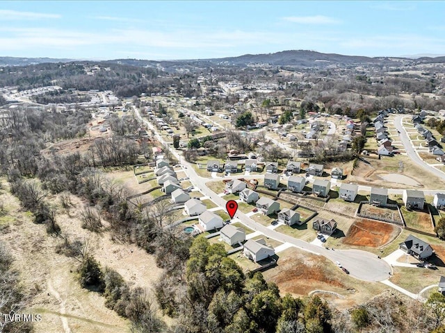 drone / aerial view with a residential view and a mountain view