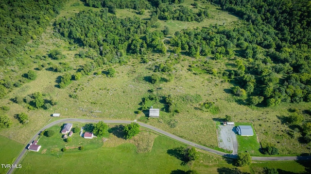 aerial view with a wooded view