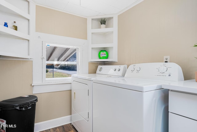 washroom featuring built in shelves, dark wood-type flooring, laundry area, independent washer and dryer, and baseboards