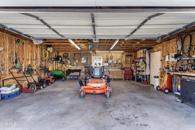 garage with a workshop area