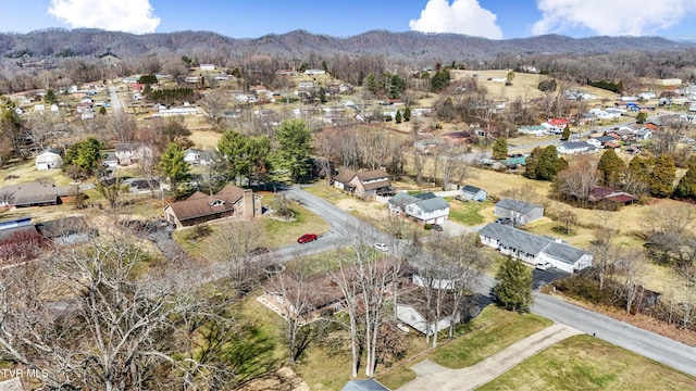 drone / aerial view with a residential view and a mountain view