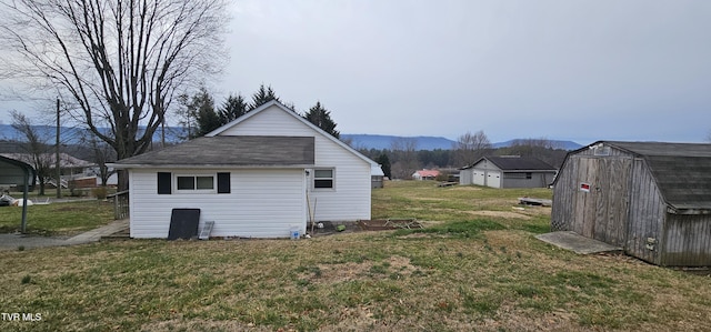 view of shed with a mountain view