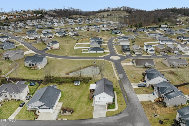 birds eye view of property with a residential view