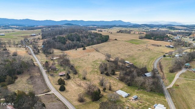 bird's eye view featuring a rural view and a mountain view