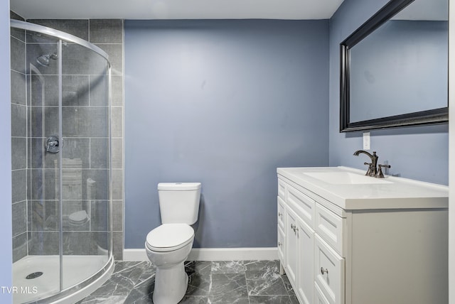 bathroom featuring baseboards, toilet, marble finish floor, vanity, and a shower stall