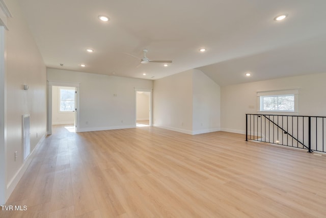 unfurnished room with recessed lighting, ceiling fan, light wood-style flooring, and baseboards