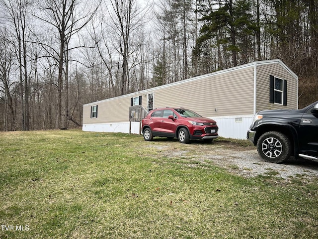 exterior space featuring a lawn