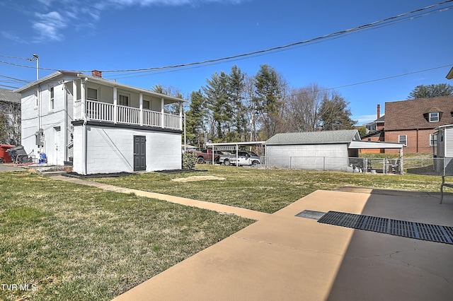 view of yard featuring a carport and fence