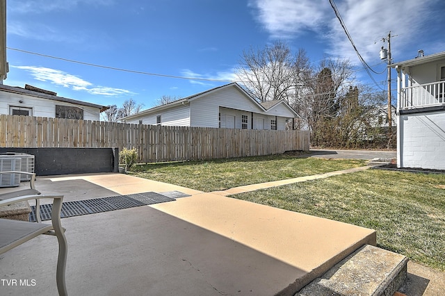 exterior space with central AC and fence