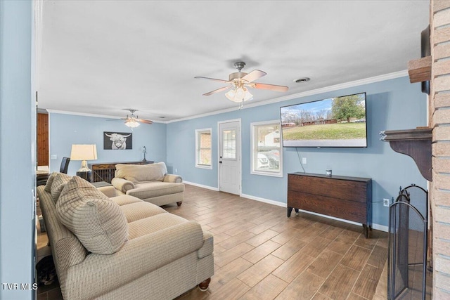 living area featuring ceiling fan, baseboards, wood finished floors, and ornamental molding