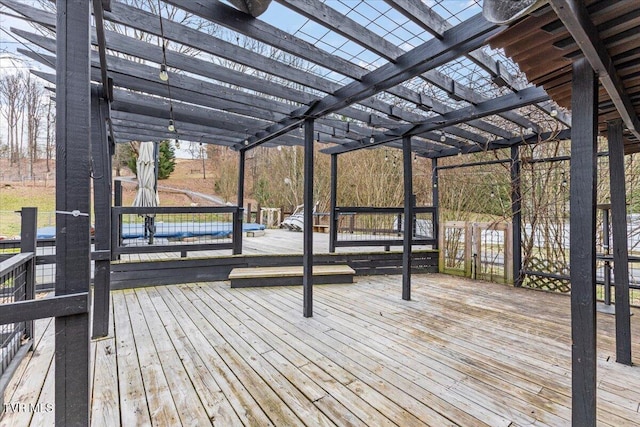 wooden terrace featuring a pergola