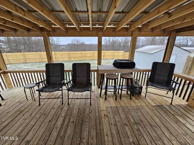 deck featuring a fenced backyard